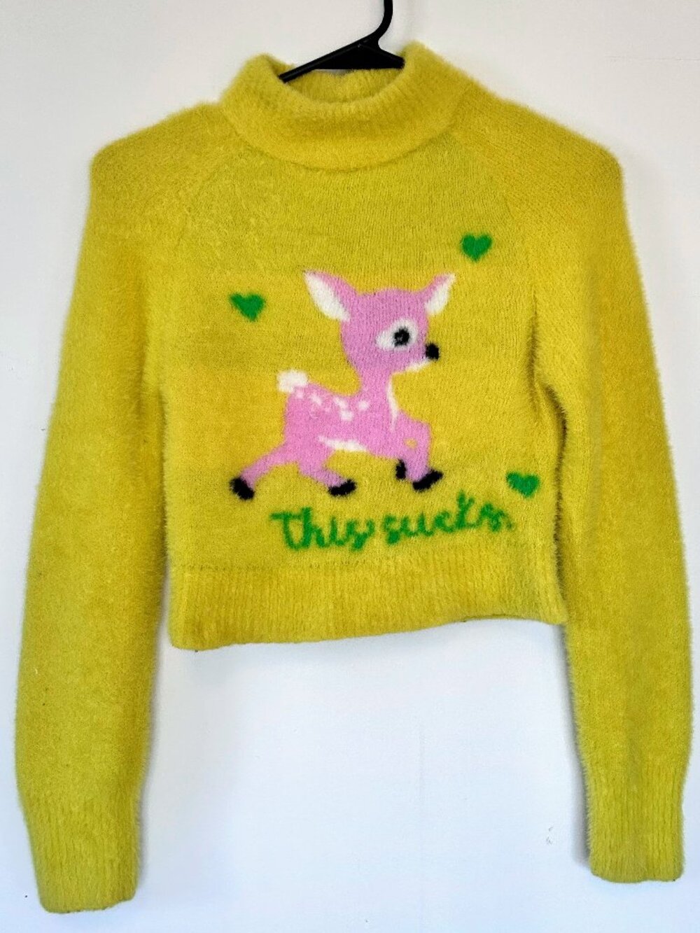 Urban Outfitters "This Sucks" fuzzy, cropped mock-turtleneck sweater